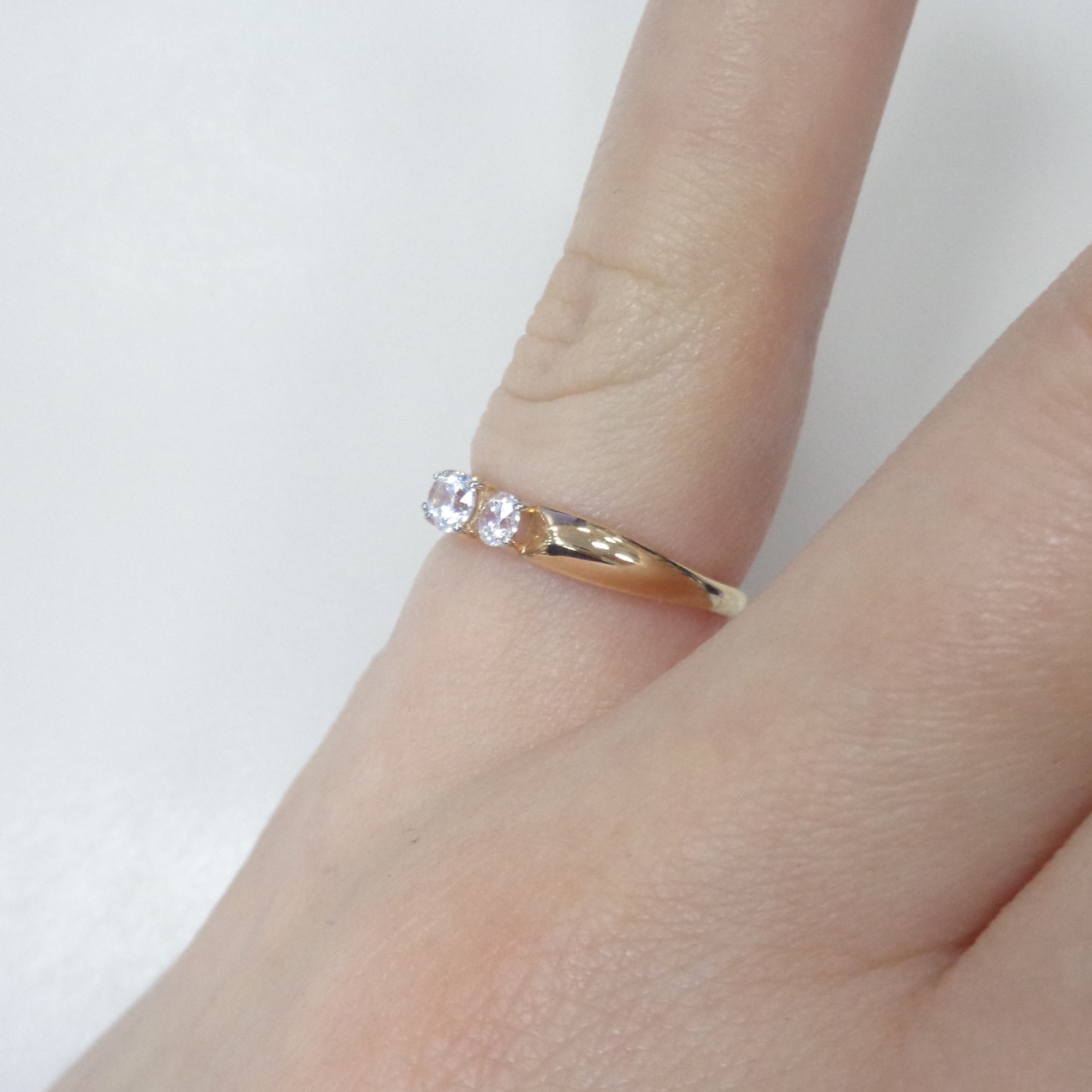 Золотое кольцо 585 пробы; родий; вставки 3 Фианит бесцв.;